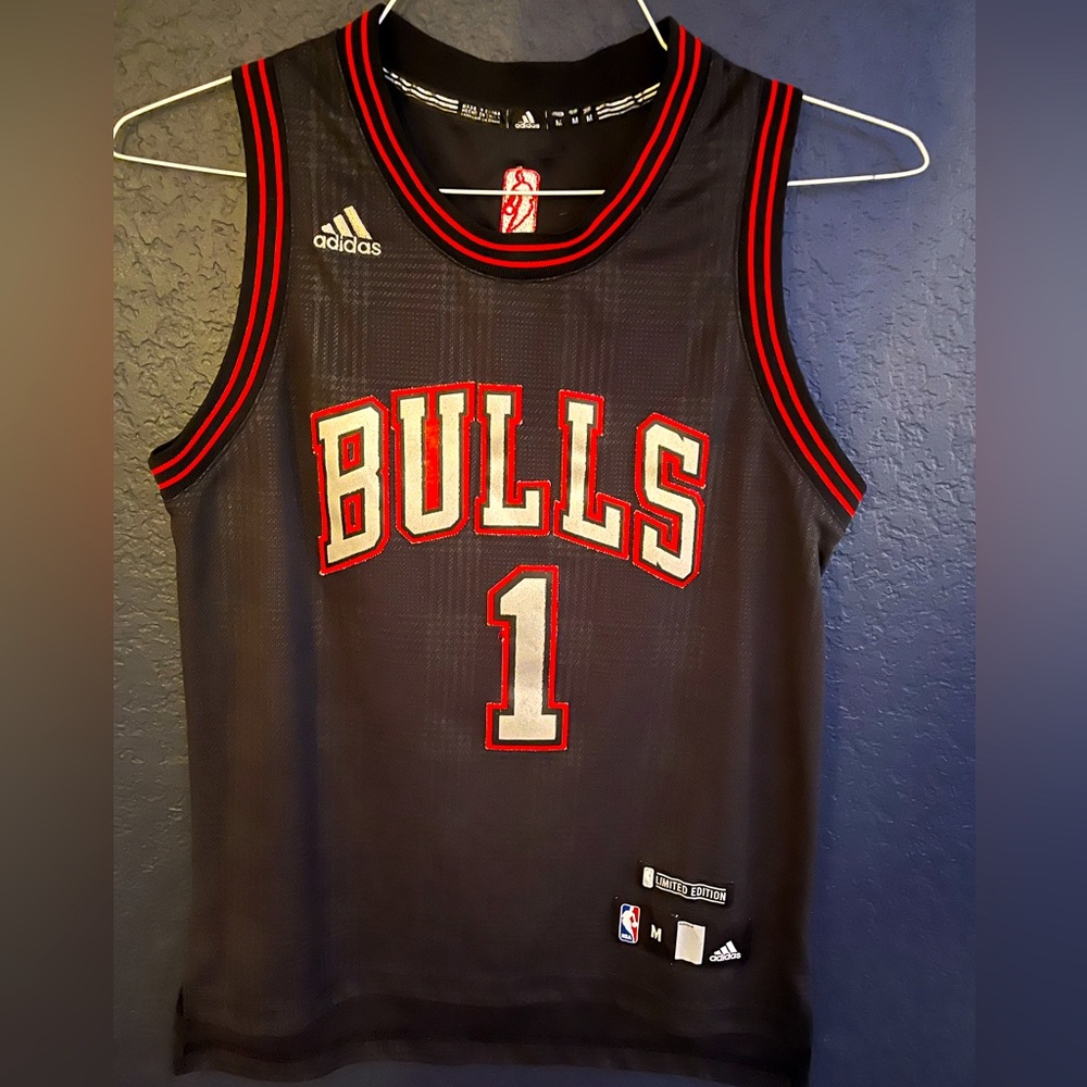 Derrick Rose, limited edition black Bulls jersey. Youth medium
